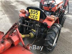 Massey Ferguson 4x4 1010 compact tractor with loader rotavator and topper