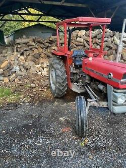 Massey ferguson 135 tractor With Browns Log Splitter