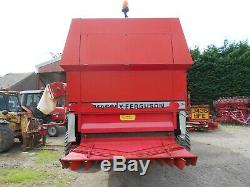 Massey ferguson 38 rs combine with header trolley