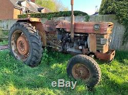 Vintage Massey Ferguson 165 tractor with topper, bale spike and new wings