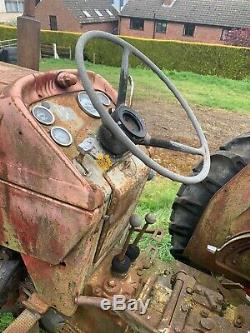 Vintage Massey Ferguson 165 tractor with topper, bale spike and new wings